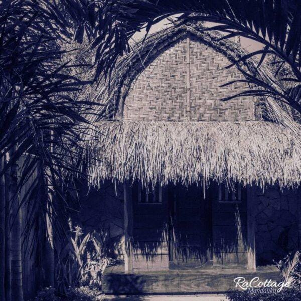 RaCottage Mandalika backpacker eco hotel Lombok with traditional thatched roof and lush tropical garden near Kuta Selatan surf spots