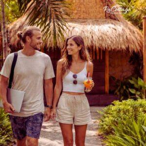 Couple enjoying a relaxed remote work lifestyle in Kuta Lombok at RaCottage Mandalika Hotel
